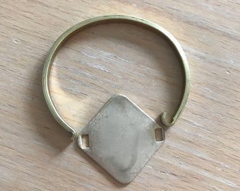 Hinge top brass bracelet with diamond connector