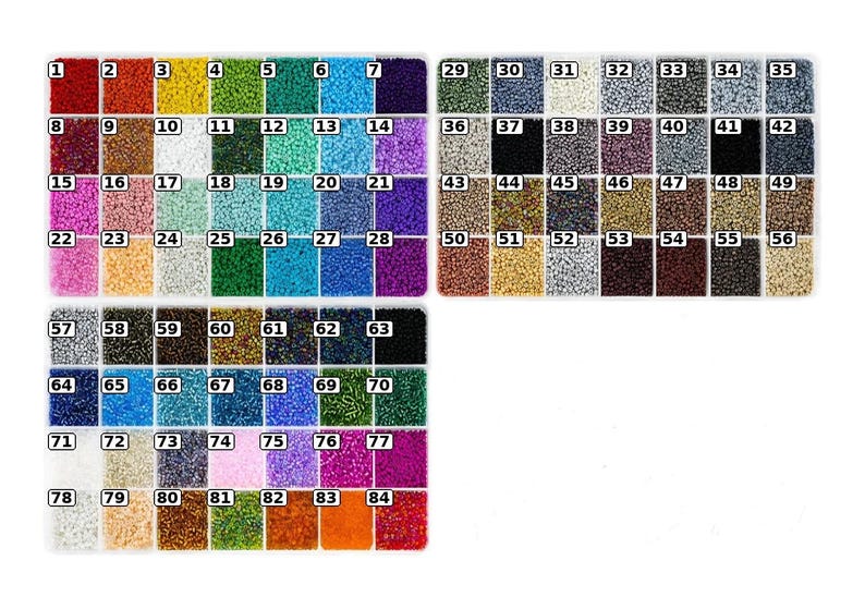 May include: A collection of small, colourful seed beads organised in three rectangular plastic containers. Each compartment holds a distinct colour, ranging from vibrant reds, blues, and greens to metallic, black, and white tones, labelled with numbers 1 through 84.