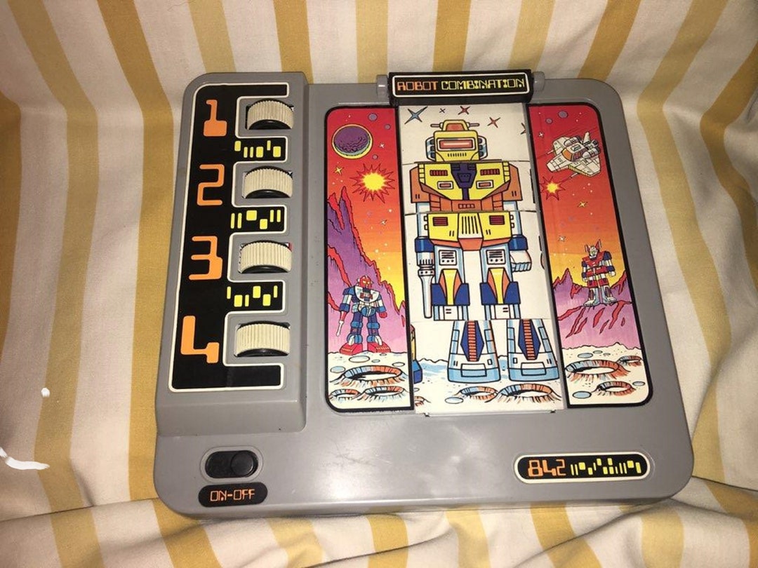 Vintage Robot Combinazione Giocattolo da Azione Giocattoli 842 gioco  trasformare Spostare i quadranti fare diversi robot puzzle Illuminarsi per  la