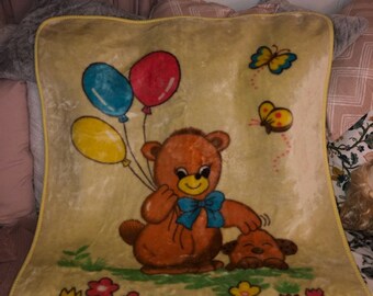 green teddy bear throw