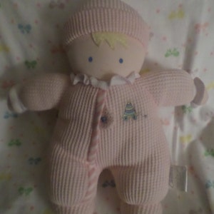 Carters Doll plush Waffle material Pink with embroidered stacking toy w stripes on front Cursive Carters Hat blonde bangs rattle in Lovey v