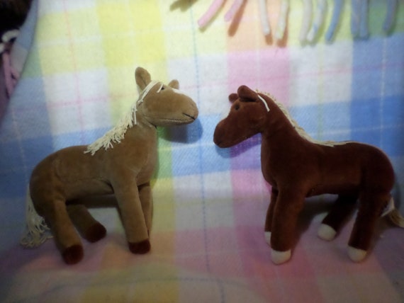 small toy horses