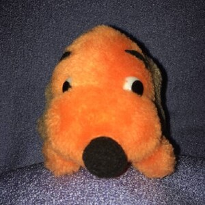 orange stuffed dog