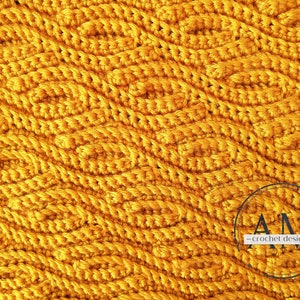 Op de afbeelding: Een close-up van een gehaakt stof met een golvend patroon in een heldere gele kleur. De stof is gemaakt met een enkele haaksteek en heeft een textuur.