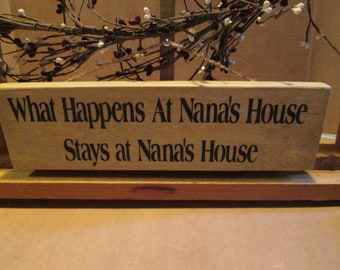 What Happens At Nana's House ... wooden sign