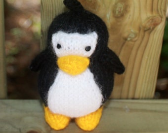 Toy knitting patterns. How to knit a penguin. Gift for baby. Nursery decoration.