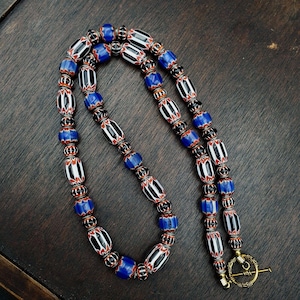 Vintage venetian style blue, black chevron 10mm-15mm beads long strand