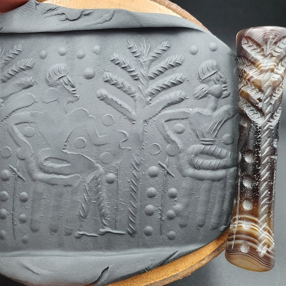 King with sword in garden antique ancient indo tibetan carving agate bead amulet
