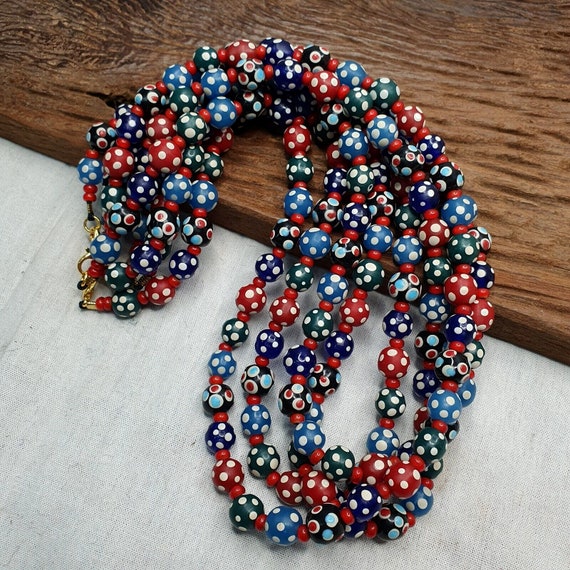 Venetian red whiteheart and venetian inspired multicolor skunk beads necklace
