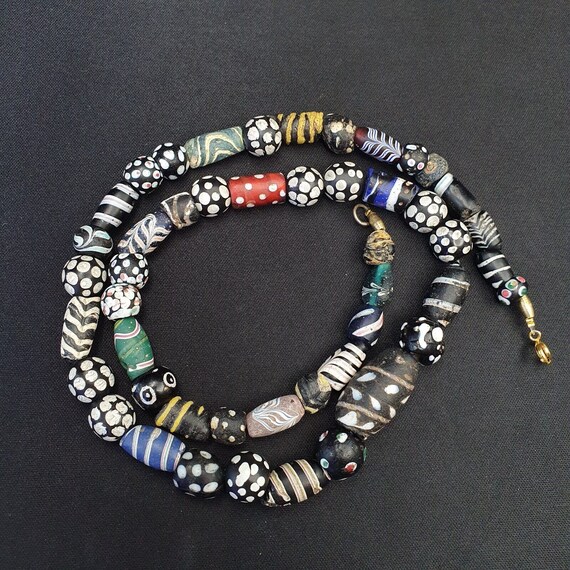 Antique venetian black  italian lampwork white feather beads, african trade