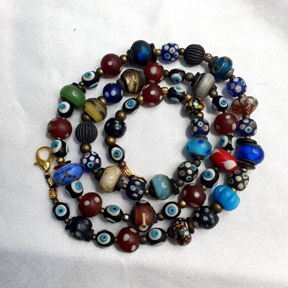 Vintage beads collection skunk, evil eye, blown glass beaded necklaceGift