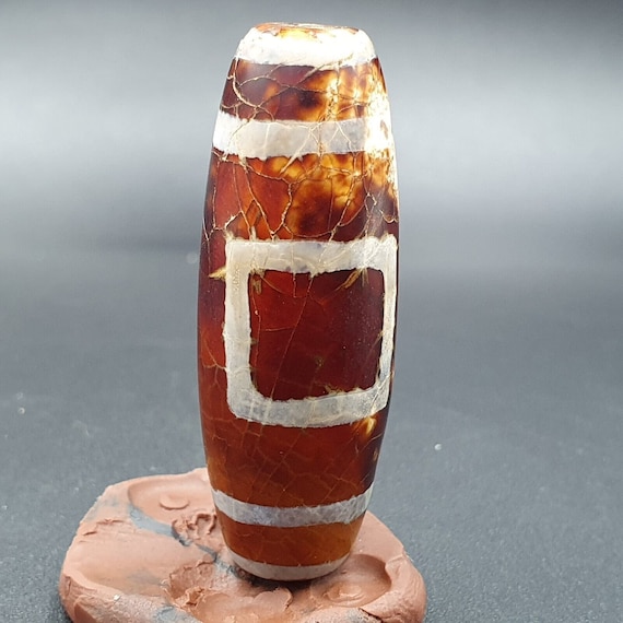 Beautiful indo tibetan etched line decorated tapered tube 2 eye dzi