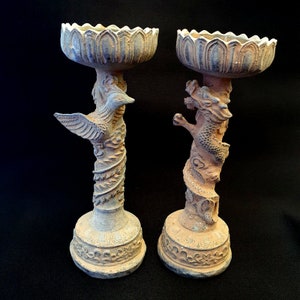 Pair of antique bronze figural candle stick holders dragon and bird figurine