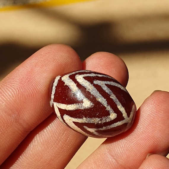 Exquisite antique tibetan etched agate bead: a rare gem from the past