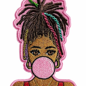 May include: Embroidered patch featuring a Black person with brown dreadlocks adorned with colorful accents. The person is blowing a pink bubble gum bubble. The patch has a pink scalloped border and a red top.