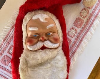 Vintage bijou toys rubber Santa face stocking