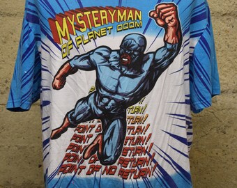 Maglietta vintage anni '90 con stampa integrale del fumetto Mystery Man (XXL)