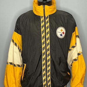 May include: Black and yellow vintage jacket with the Pittsburgh Steelers logo on the chest. The jacket features a high collar, a full zipper, and yellow and white accents on the sleeves. The jacket has a zig-zag pattern down the front.