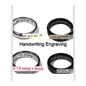 May include: Four silver and black wedding bands with handwritten engravings. The engravings include "Amor de mi vida T", "I love you forever B", "C+S always & forever", and "I love you".