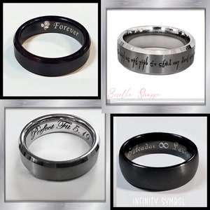 May include: Four different men's wedding bands with various engravings. The bands are made of black and silver metal. The engravings include "Forever", "Gibit us 145 off ripb to st&aring;l our lovf", "Perfect Fit 5.19", and "Salvador &infin; Laura".