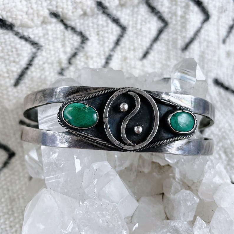 Rare vintage 1960s Navajo sterling silver and two-stone turquoise peace sign cuff bracelet