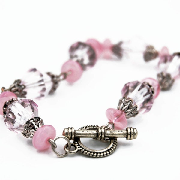 Multi faceted pink bead bracelet, filigree toggle clasp, antiqued metal beads, translucent baby pink, oxidized metal