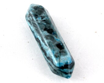 Blue Green Crazy Lace Agate Cabochon. A Turquoise Blue Colored Stone with Six Sides. A Hexagonal Shaped Stick Bead with Black Swirl Pattern