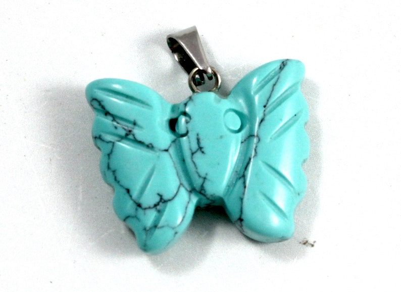 Howlite Butterfly Pendant A Turquoise Colored Stone Ornament for Making Animal Lover Jewelry A Blue Carved Gemstone Insect Decoration