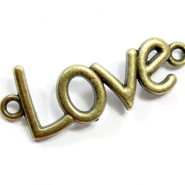 Antique Bronze « Love » connecteur perle. (2) courbe connecteur à deux trous Love en métal. Grosse Perle en métal pour la fabrication de bijoux. Perles de bronze 40 x 15 mm