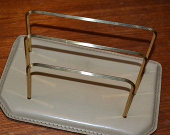 1960s vintage slip Holder