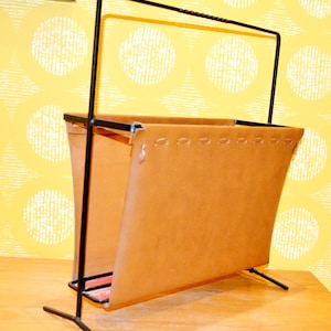 Vintage newspaper rack metal black with brown faux leather pockets 70s Rockabilly design retro mid century