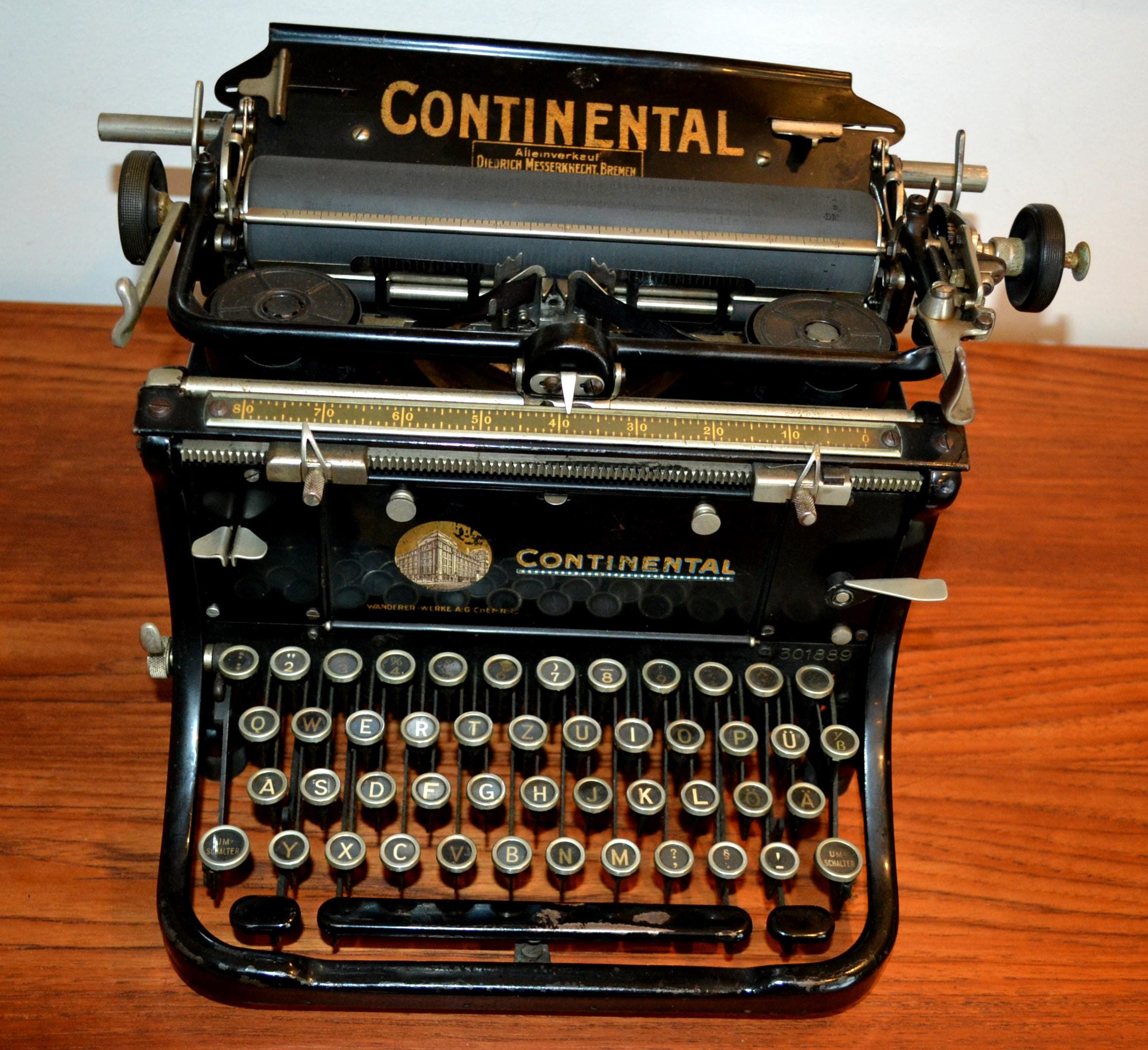美しいヴィンテージのコンチネンタル製タイプライター、黒と金、1920 
