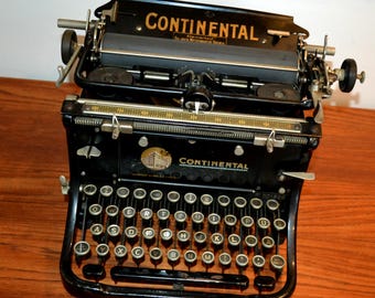 1920s 10 USA製 アンティークタイプライター ヴィンテージ 美しいヴィンテージのコンチネンタル製タイプライター、黒と金、1920