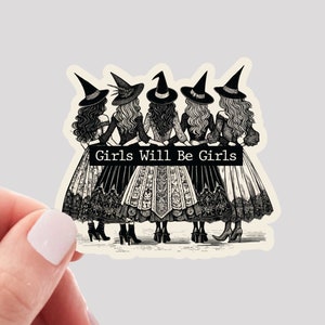 May include: A black and white sticker featuring a vintage illustration of five women in witch hats and dresses. The text "Girls Will Be Girls" is displayed on a banner. The sticker is waterproof vinyl.
