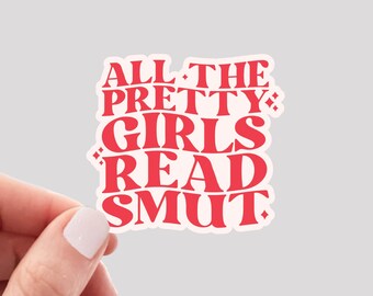 May include: Red vinyl sticker with the text "All the pretty girls read smut."