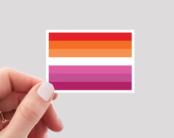 May include: A sticker with a lesbian pride flag design. The flag has five horizontal stripes: red, orange, yellow, pink, and purple.
