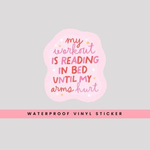 May include: Pink and white sticker with the text "my workout is reading in bed until my arms hurt". The sticker is a waterproof vinyl sticker.