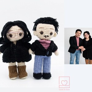 Close-up of a personalized amigurumi couple with custom details, perfect 1st anniversary (paper/cotton) gift created from reference photos.