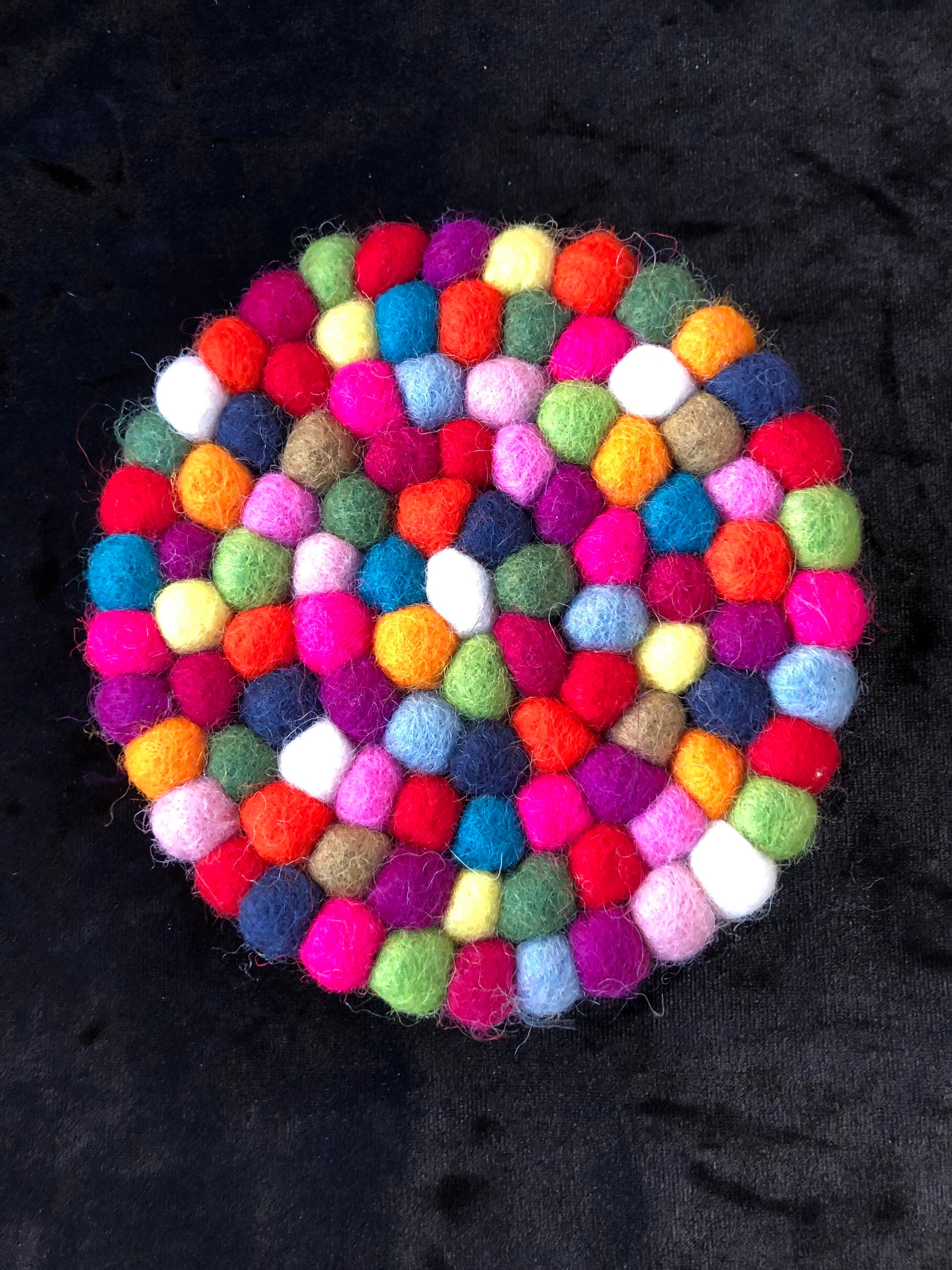 Felt pom pom round multicolour coasters handmade in Nepal. Etsy