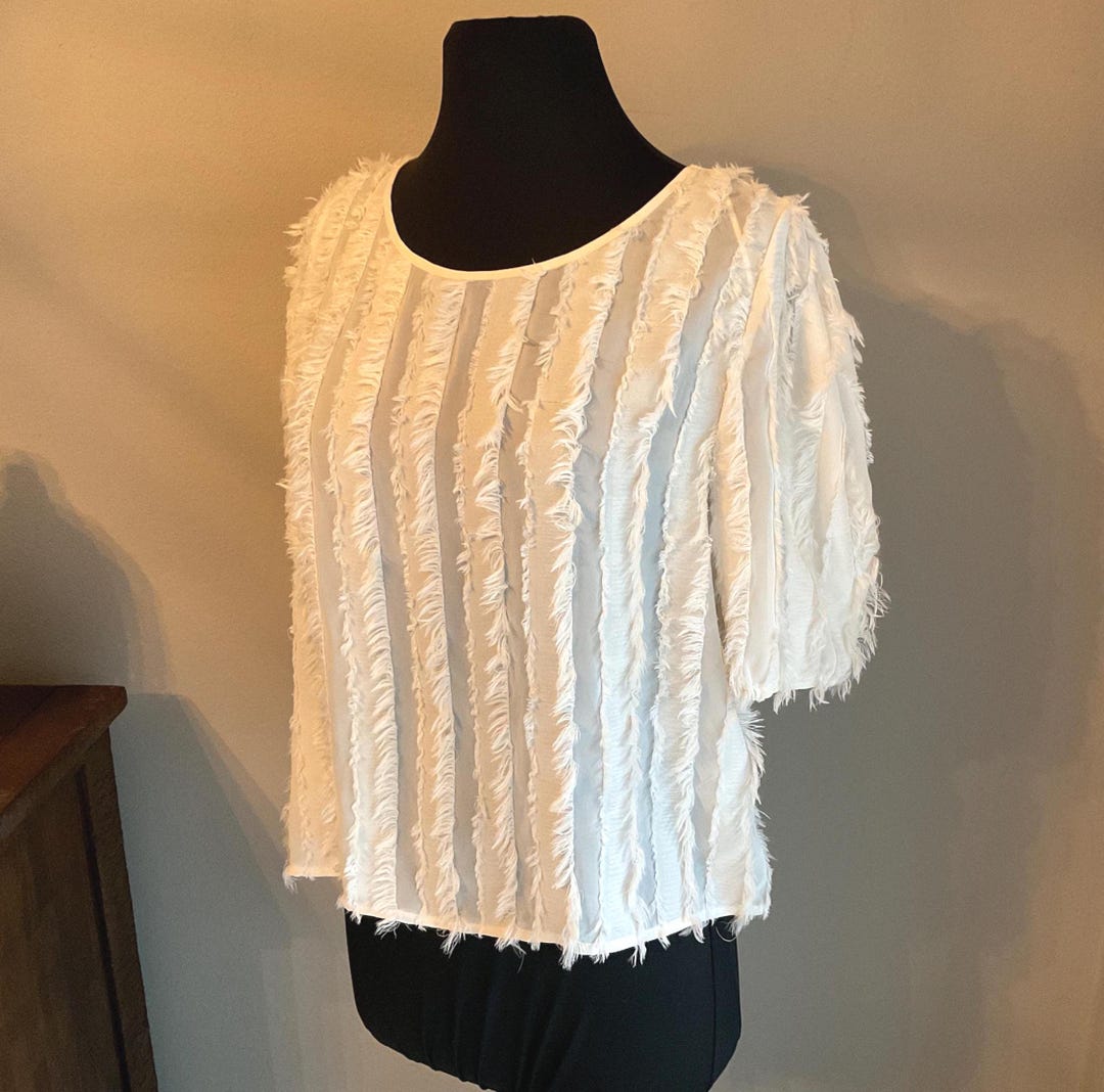 Offwhite Zara vibes with feathers