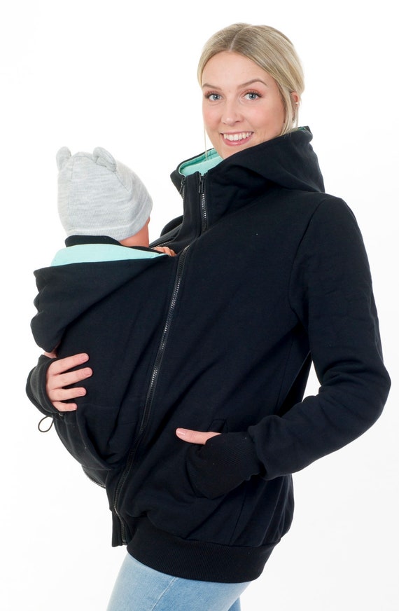 baby wearing sweater