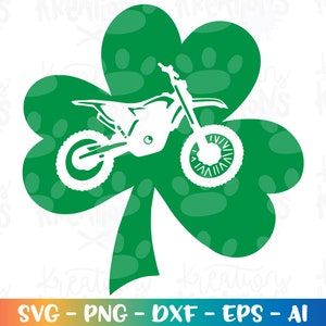 May include: A green shamrock with a white silhouette of a dirt bike inside. The bike has two wheels and a handlebar.