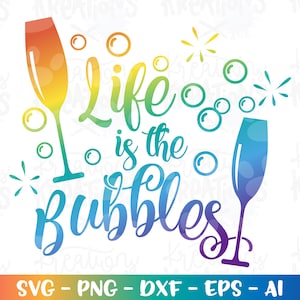 May include: A rainbow gradient design with the text "Life is the Bubbles" and two champagne glasses. The glasses are filled with bubbles.