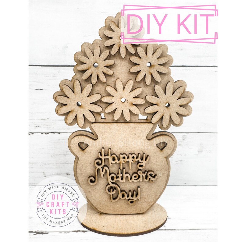 May include: DIY craft kit to make a wooden sign with a vase and flowers that says "Happy Mother's Day".