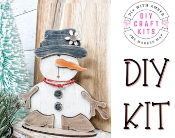 Kit de manualidades para hacer una pequeña muñeca de nieve / Madera sin terminar / Actividad de pintura / Muñeco de nieve navideño de invierno ck1057