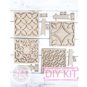 May include: DIY craft kit with four laser cut wooden tiles featuring intricate geometric patterns. The kit includes all the pieces needed to create a decorative wall hanging or shelf. The tiles are made of natural wood and have a light brown color. The kit also includes the text "DIY KIT" in pink.
