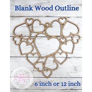 May include: A blank wood outline in the shape of a heart, featuring multiple heart cutouts. The text "Blank Wood Outline" is at the top, with "6 inch or 12 inch" at the bottom. The DIY Craft Kits logo is in the lower left corner.