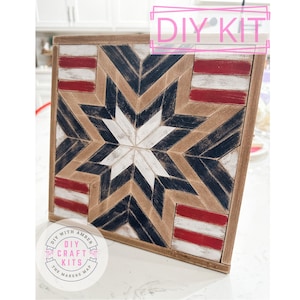 May include: DIY craft kit featuring a wooden starburst design with red, white, and blue stripes. The kit is from The Makers Map, a DIY craft kit company.