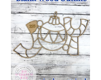 May include: A blank wood outline of the word "JOY" with a Christmas ornament design. The text "Blank Wood Outline" is at the top, and "6 inch or 12 inch" is at the bottom. The DIY Craft Kits logo is in the lower left corner.