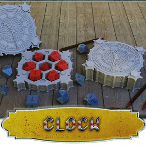 May include: A gray 3D printed dice tower shaped like Big Ben, the famous clock tower in London, England. The tower is open and has red dice inside. The top of the tower is a separate piece that is also 3D printed and shaped like the clock face of Big Ben. The word "CLOCK" is written in a banner below the tower.